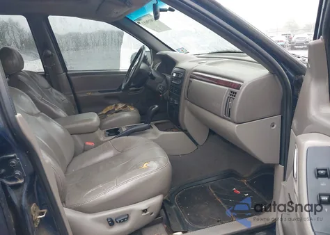 2000 Jeep Grand Cherokee Laredo из США, поврежденный, VIN 1J4GW48S7YC247210